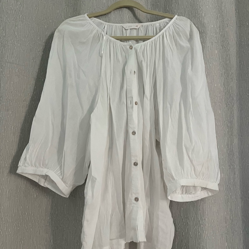 White peasant top by Loren Conrad